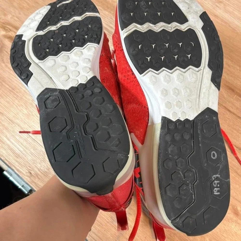 Red sneakers in US 12 Nike